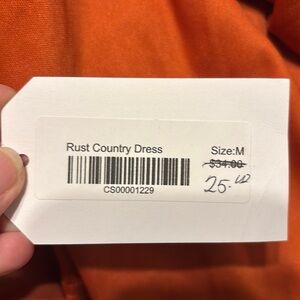 Rust country dress with gold stars. Never worn.